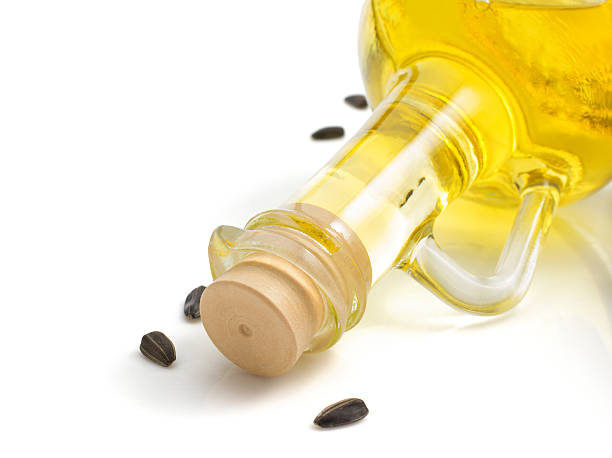 istock bottle of oil isolated at white 488494702