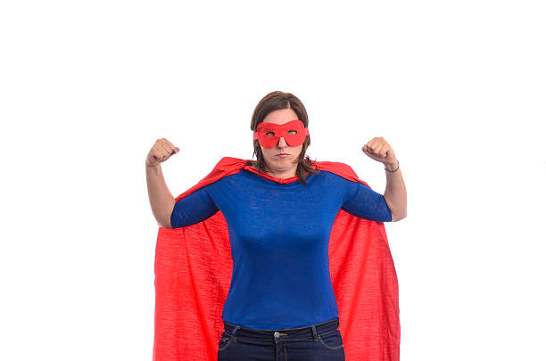 istock Woman superhero with red cape. 488495914