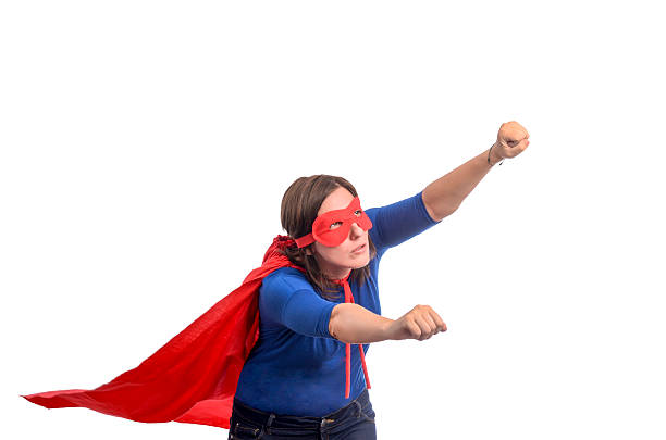 istock Woman superhero with red cape. 488496378