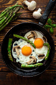 istock Fried Eggs With Asparagus 488496945