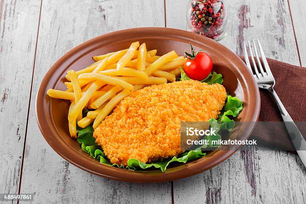 Breaded Chicken Schnitzel Fries Stock Photo - Download Image Now - Chicken Meat, Schnitzel, Breaded