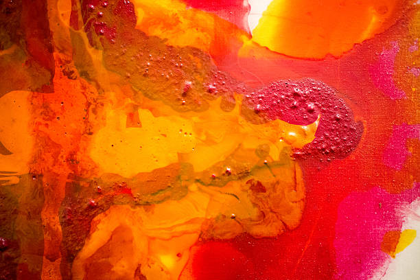 Vibrant red and orange paint daubs