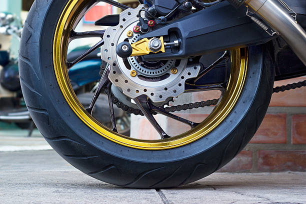 istock Motorcycle wheel and ABS brakes on street 488498760