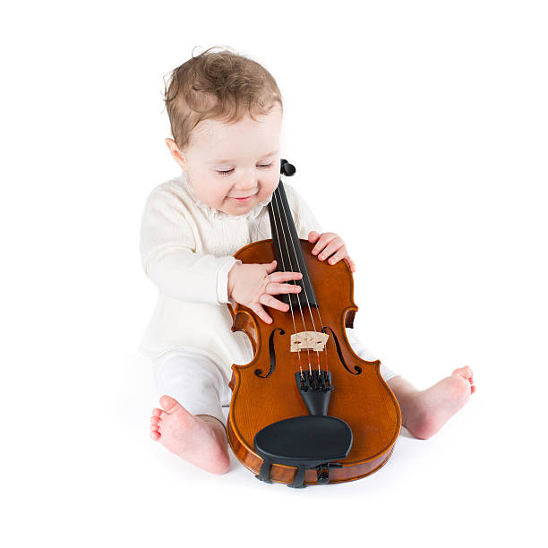 istock Funny little baby playing violin 488499809