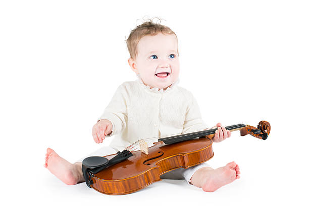 istock Sweet funny baby playing violin 488499831