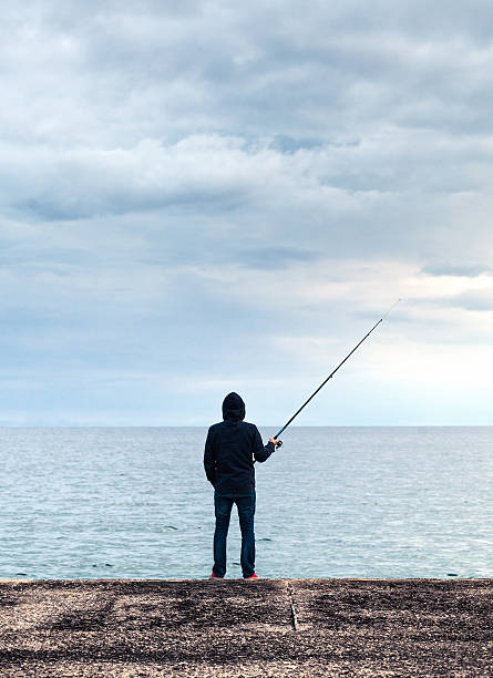 istock Lonely fisherman 488502699