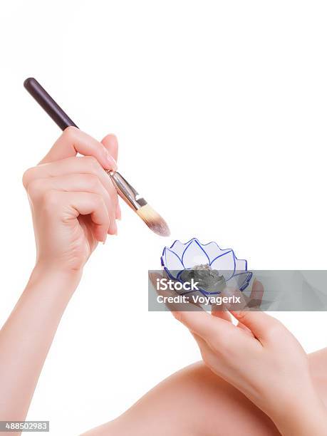 Skin Care Woman Applying Clay Mask On Face Spa Stock Photo - Download Image Now - Adult, Algae, Anti Aging