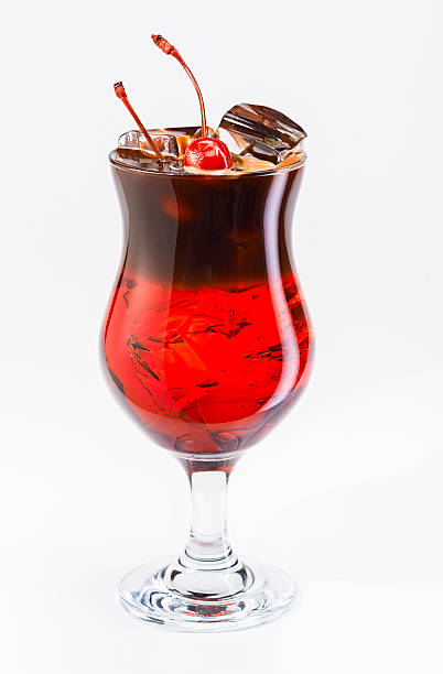 Cocktail with Coffee, Cherry and Martini Drink. Ice Cubes. White. stock photo