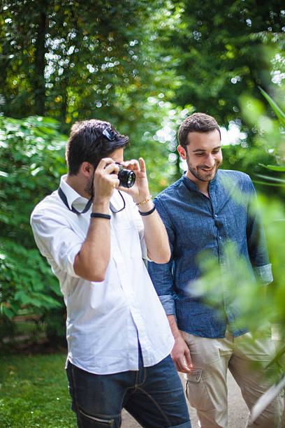 istock Group of Friends Talking in the Park 488505188