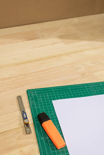 istock Green Paper Cutting board on wood table 488506936
