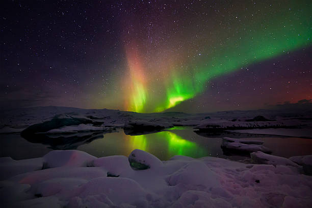istock Mixed aurora dancing over the Jokulsarlon lagoon, Iceland 488508550