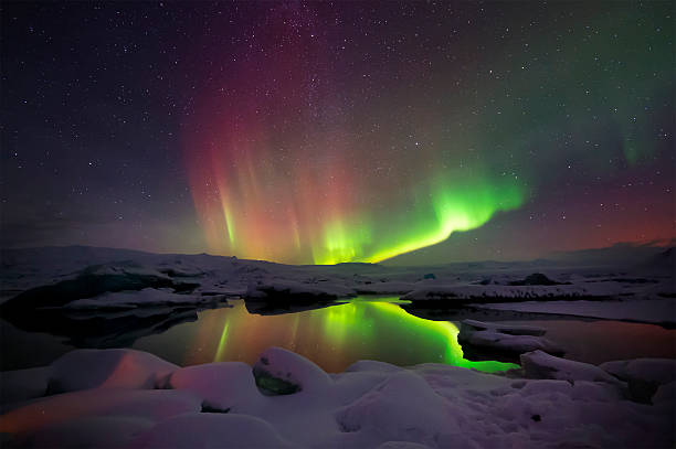 istock Mixed aurora dancing over the Jokulsarlon lagoon, Iceland 488508574