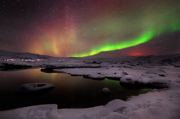 istock Mixed aurora dancing over the Jokulsarlon lagoon, Iceland 488508694