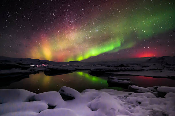 istock Mixed aurora dancing over the Jokulsarlon lagoon, Iceland 488508734
