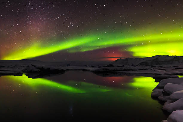 istock Mixed aurora dancing over the Jokulsarlon lagoon, Iceland 488508796