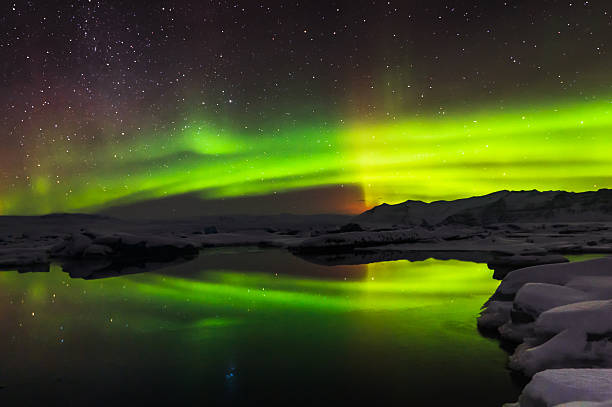 istock Mixed aurora dancing over the Jokulsarlon lagoon, Iceland 488508828