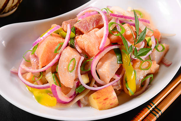 Salmon Ceviche Salmon ceviche with onions rigs and apple peaces seviche photos stock pictures, royalty-free photos & images