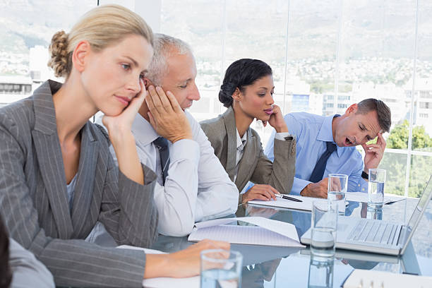 istock Tired business team at conference 488509858