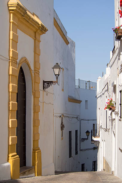 istock Narrow street people in Spain 488516738