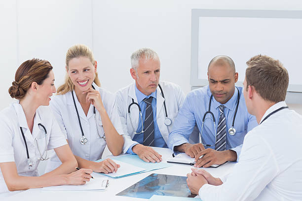 istock Team of doctors having a meeting 488517784