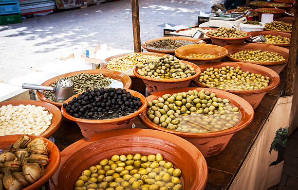 istock Different marinated olives and local food on spanish street mark 488519034