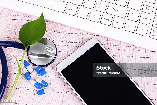 Online Medical Servicexray And Smartphone With Stethoscope Stock Photo - Download Image Now