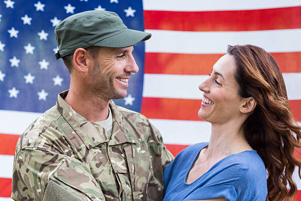 istock Handsome soldier reunited with partner 488520490