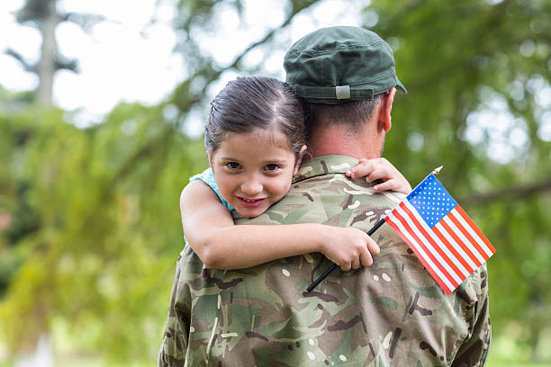 istock Soldier reunited with his daughter 488521256