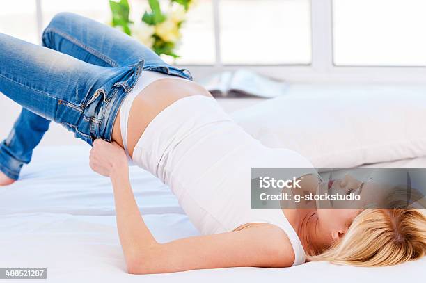 Too Tight Stock Photo - Download Image Now - Adult, Adults Only, Beautiful People