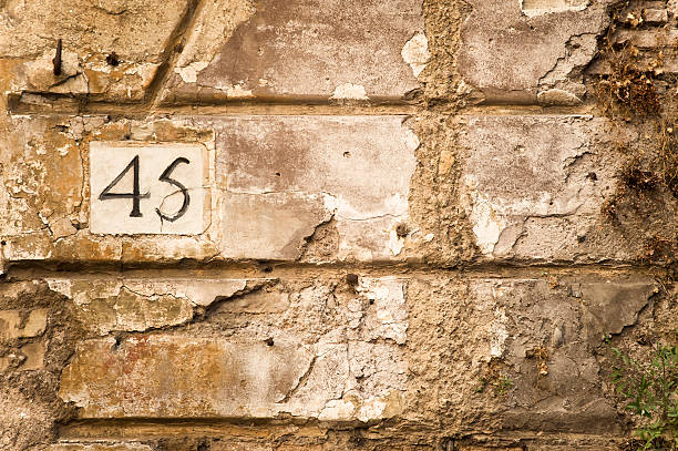 istock Number  forty five in the old wall 488523676