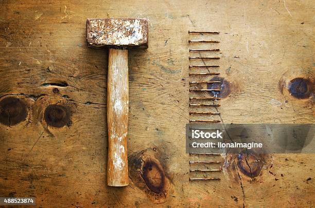Vintage Wood Table With Hammer And Nails Stock Photo - Download Image Now - 2015, Art And Craft, Arts Culture and Entertainment