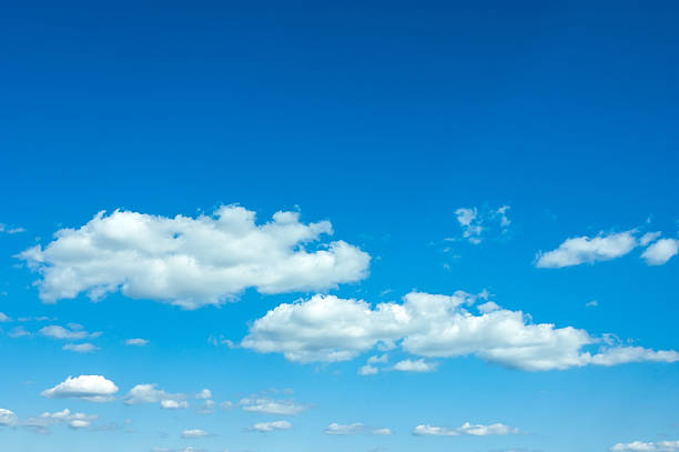 istock beautiful blue sky with clouds and sun 488525796