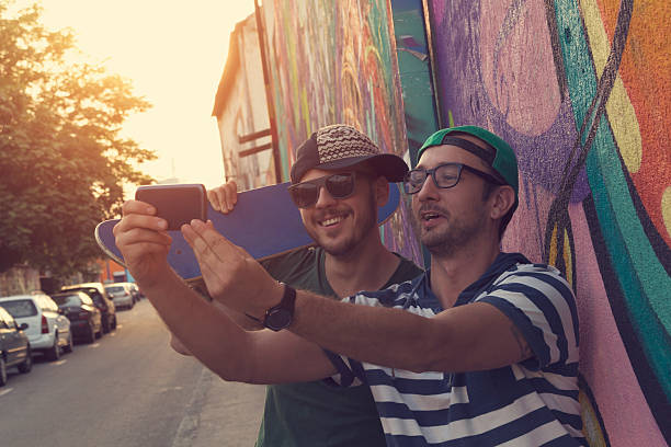 istock Couple of guys doing a selfie. 488529942