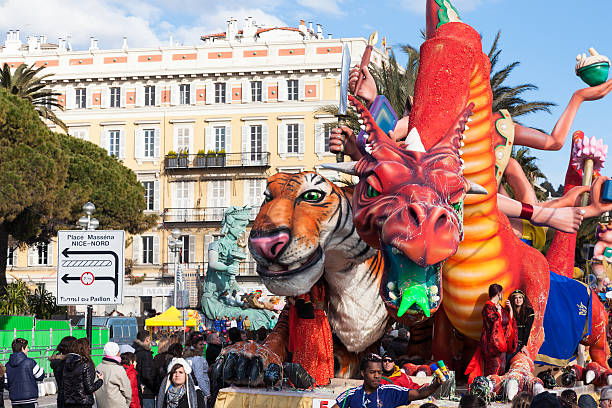 Nice, France - February 26, 2013: Parade floats during the Carnival of Nice on the French Riviera. The theme for 2013 was King of the five continents.