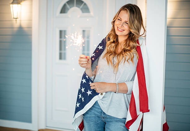 istock Woman in front of a house. 488534648