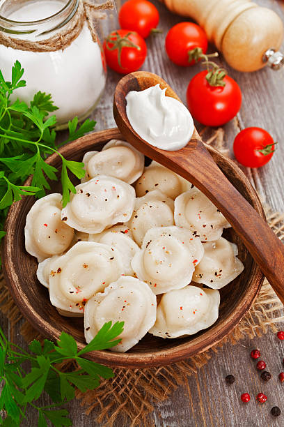 Dumplings with meat Delicious dumplings in the plate on the table russian pelmeni stock pictures, royalty-free photos & images
