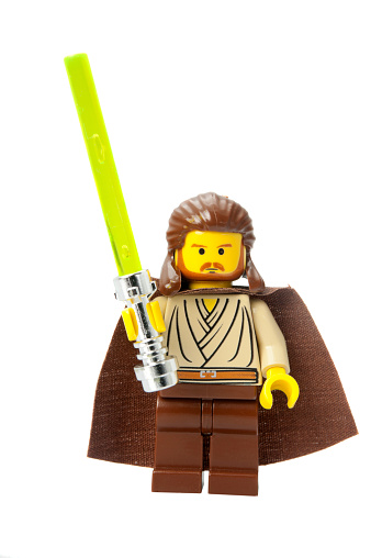 Adelaide, Australia -  February 26, 2015: A studio shot of a Qui-Gon Jinn Lego minifigure from the Star Wars Movies. Lego is extremely popular worldwide with children and collectors.