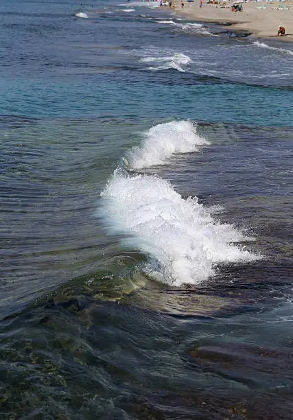 beautiful sea wave with foam is photographed close-up