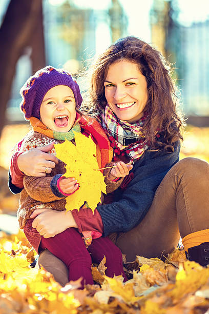 istock Mother and daughter in the park 488536622