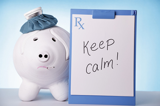 Big piggybank with a prescription that reads: Keep calm!