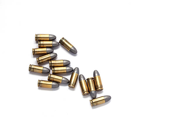 istock 9mm bullet for a gun isolated on white background. 488540848