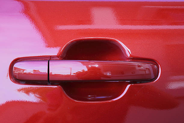 istock close up of Red car door handle 488543924