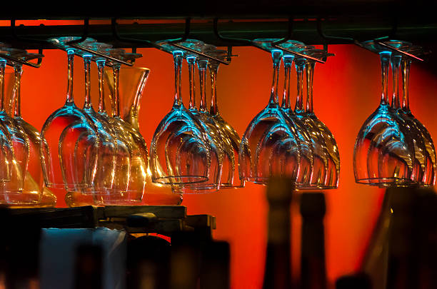 istock Wine Glasses Hanging in a Rack 488544050