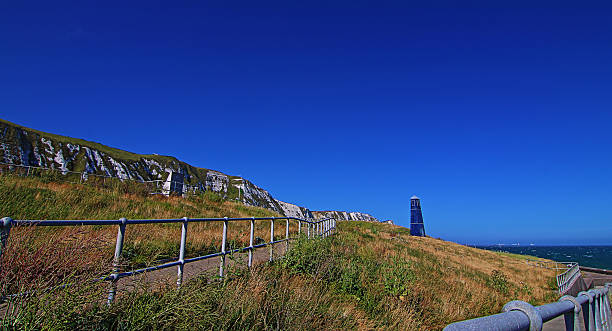 istock Samphire Hoe Tower at the Dover Cliffs on sunny day 488545234