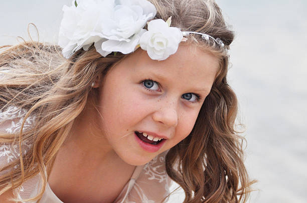 istock Young girl looking up at the camera 488546328