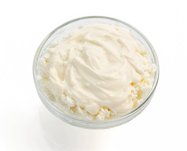 istock cottage cheese in bowl on white 488552166
