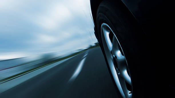 istock Car ride on road - motion blur 488556200