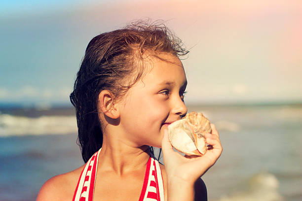 istock girl on the beach 488556848