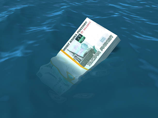 istock Money sinking in water 488557695