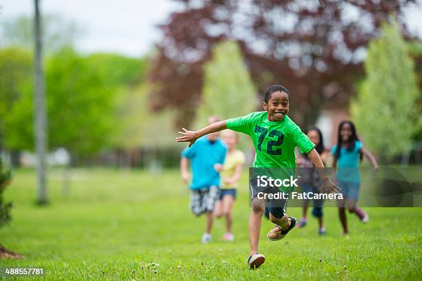 Running Stock Photo - Download Image Now - 6-7 Years, 8-9 Years, African Ethnicity